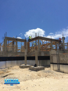 Outside view of the pillars of the home being built.
