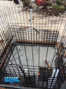 Rebar for the outdoor pump is under construction.