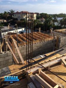 Wooden boards create formwork of the second floor.