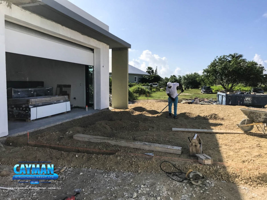 Driveway gravel is poured.