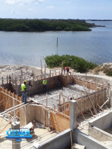 A view of the pool with the rebar grid and plastic down.